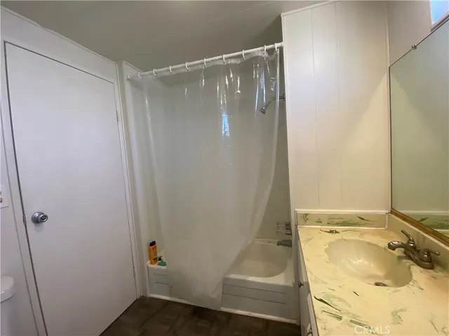 a room with a bed and a window