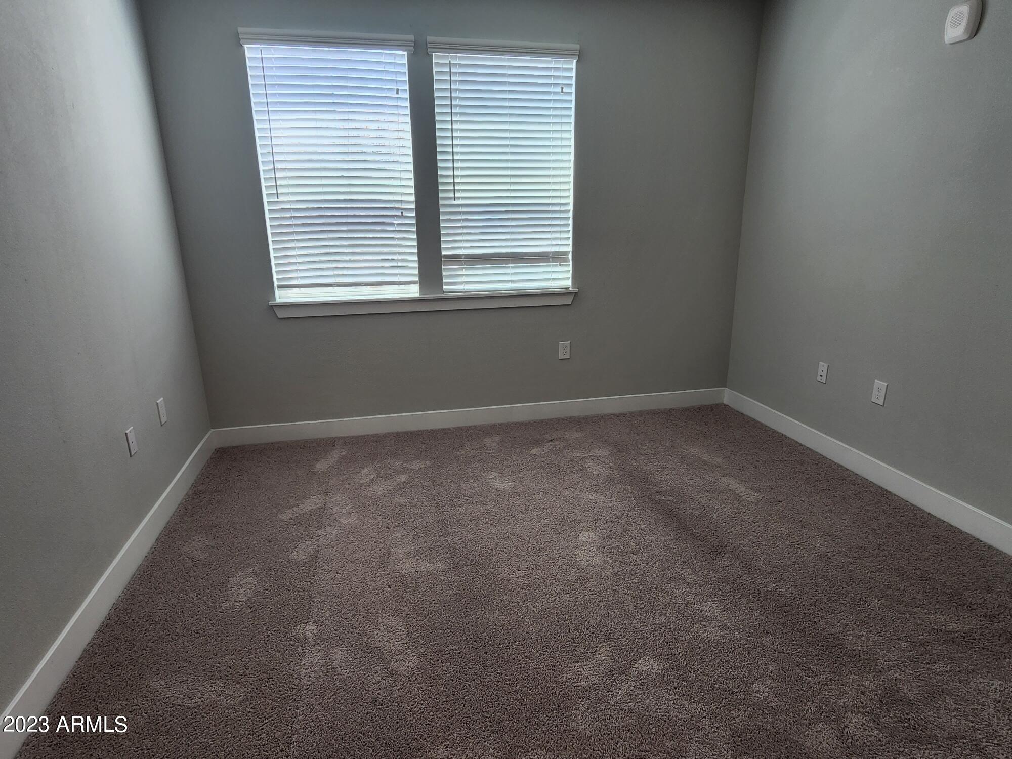 15510 North La Cometa Avenue, Unit B4 Surprise, AZ 85374 - Photo 11 of 29 Bedroom 2