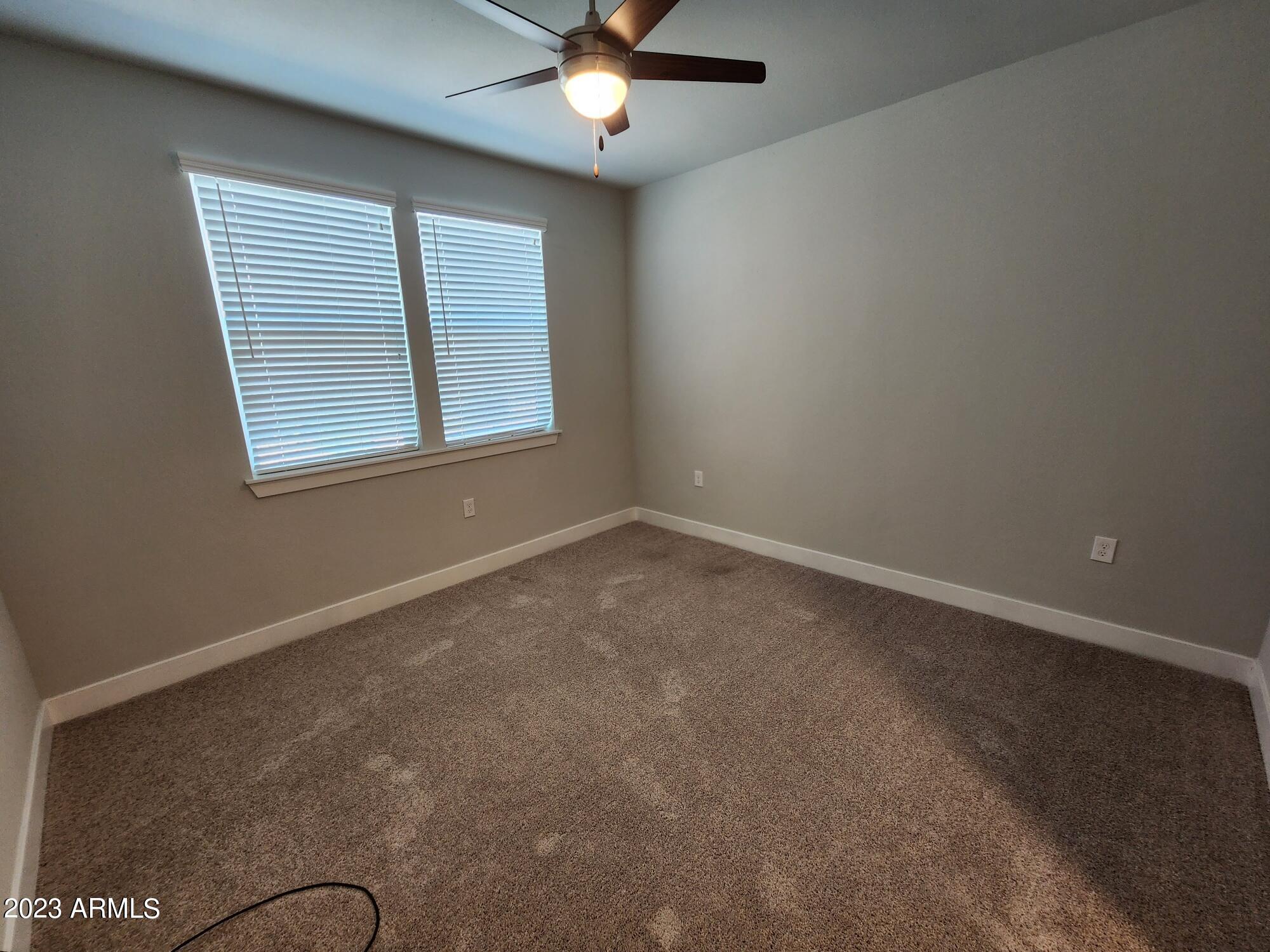 15510 North La Cometa Avenue, Unit B4 Surprise, AZ 85374 - Photo 7 of 29 Master Bedroom