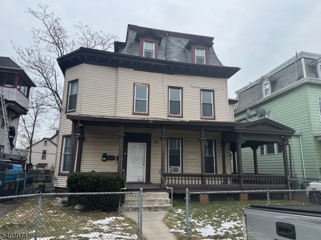 a front view of a house with yard