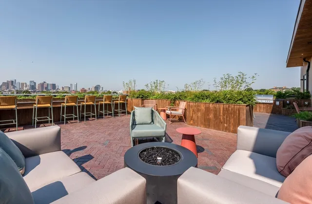 a view of a balcony with chairs