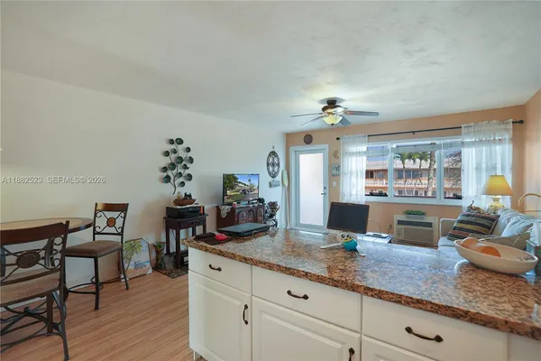 a kitchen with granite countertop lots of counter top space