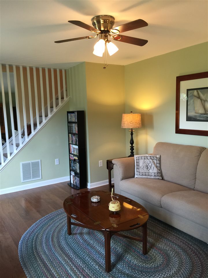 1822 Tinkling Spring Road Staunton, VA 24401 - Photo 16 of 49 a living room with furniture and a lamp