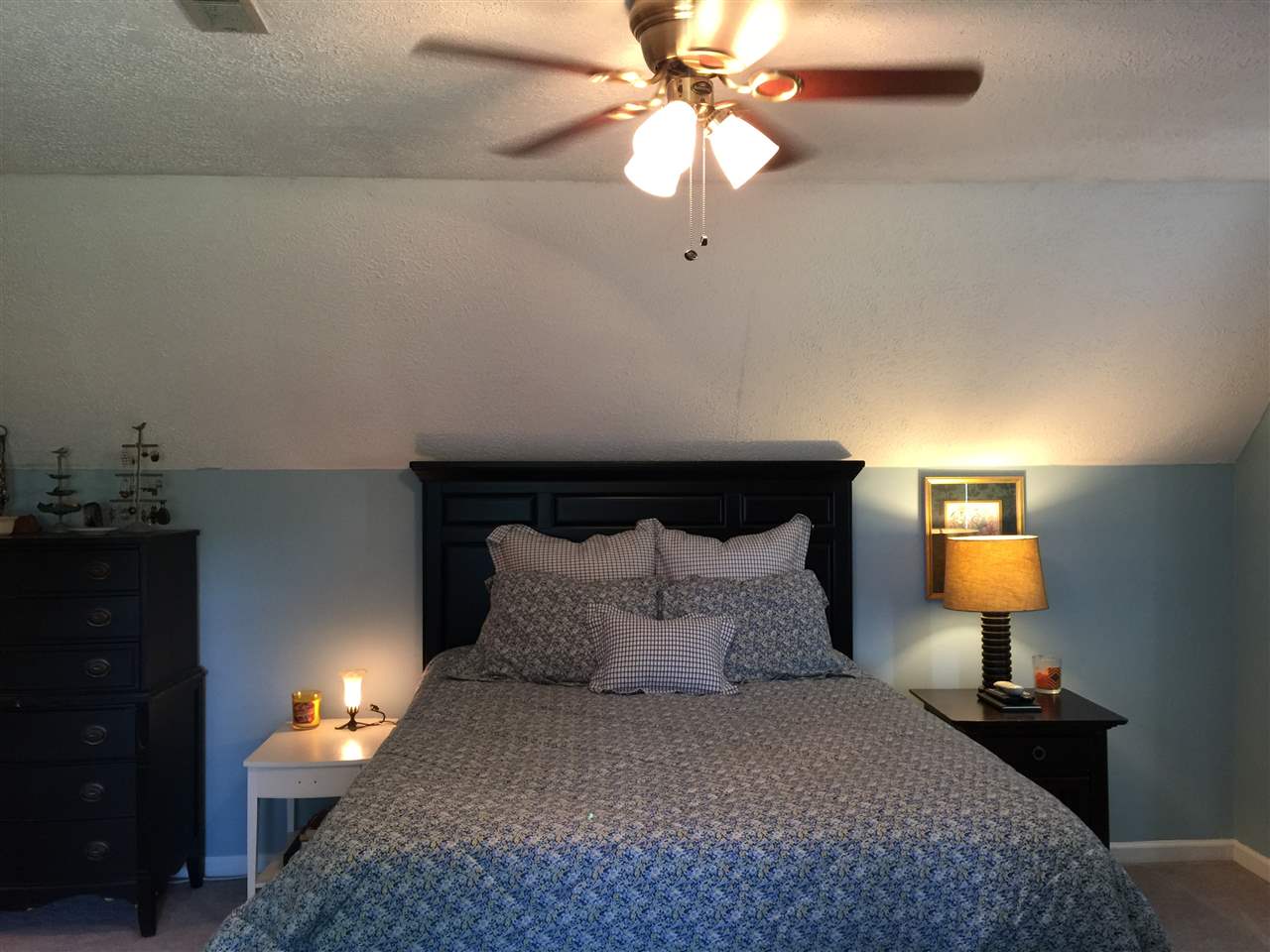 1822 Tinkling Spring Road Staunton, VA 24401 - Photo 35 of 49 a bedroom with a bed and a lamp