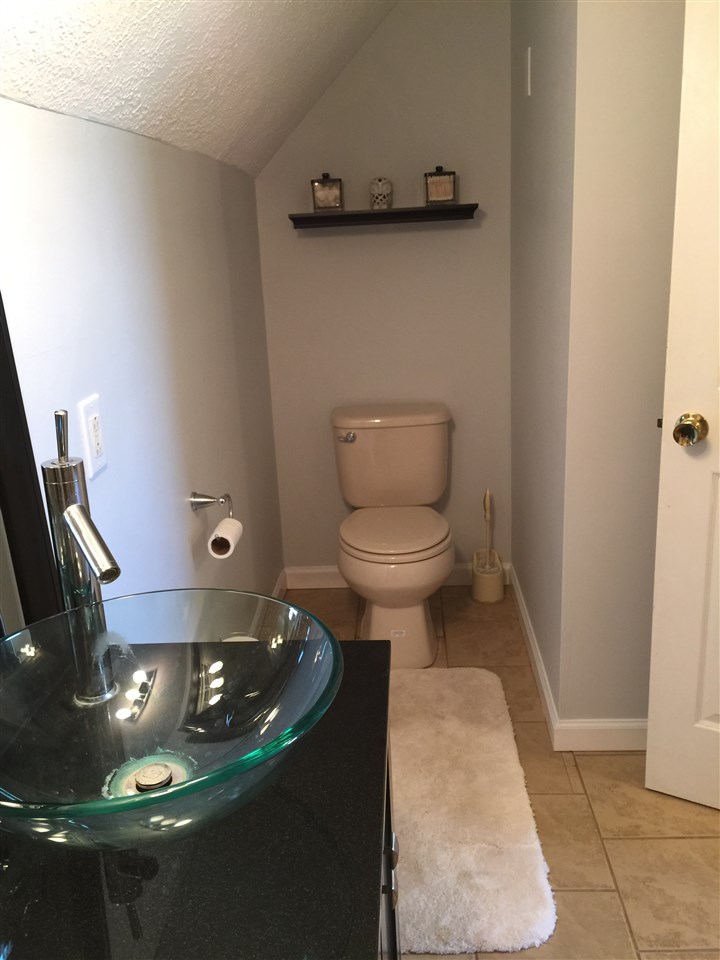 1822 Tinkling Spring Road Staunton, VA 24401 - Photo 45 of 49 a picture of a bathroom with a sink and toilet