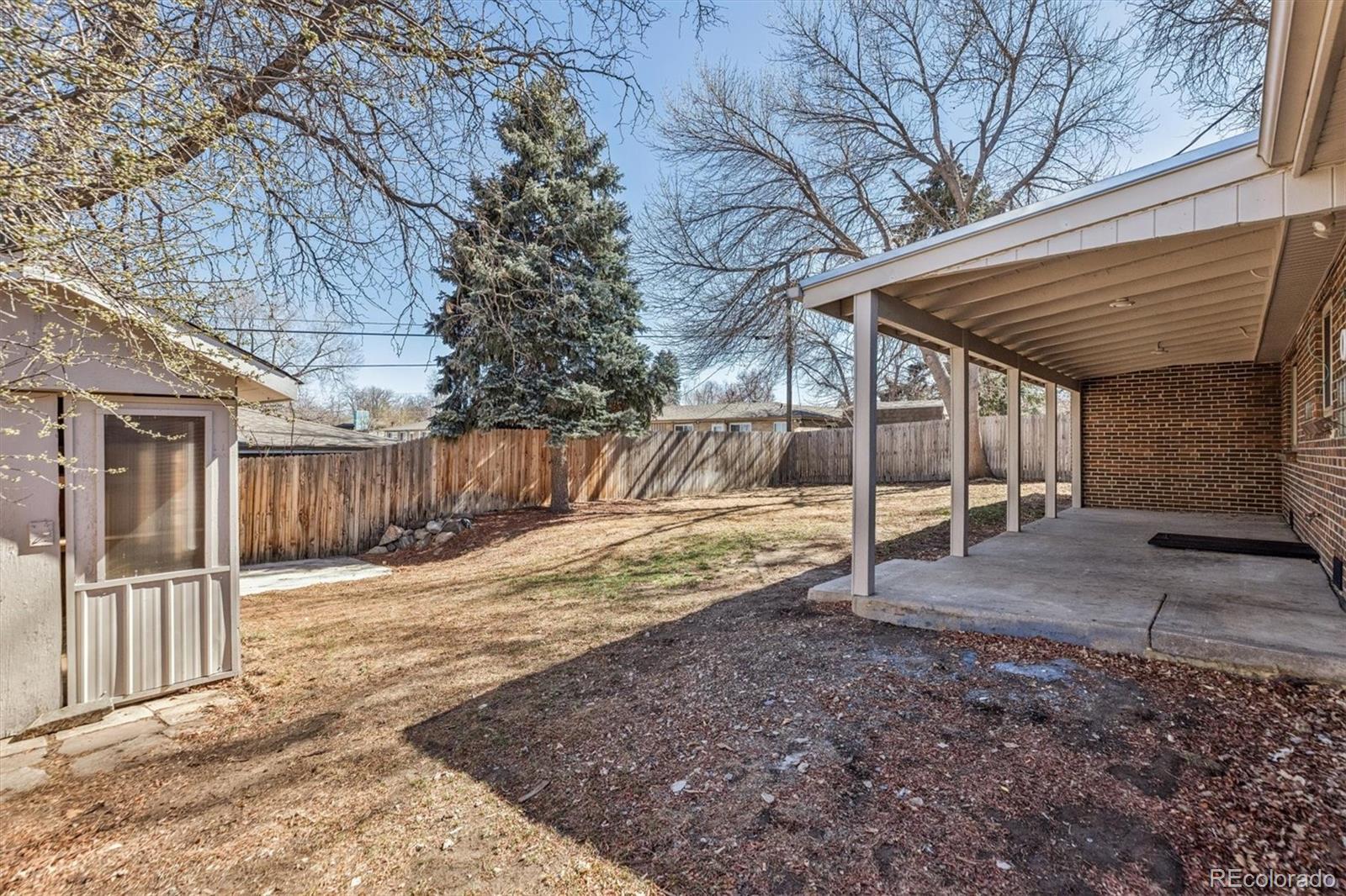4170 North Lamar Street Wheat Ridge, CO 80033 - Photo 19 of 26 a backyard of a house