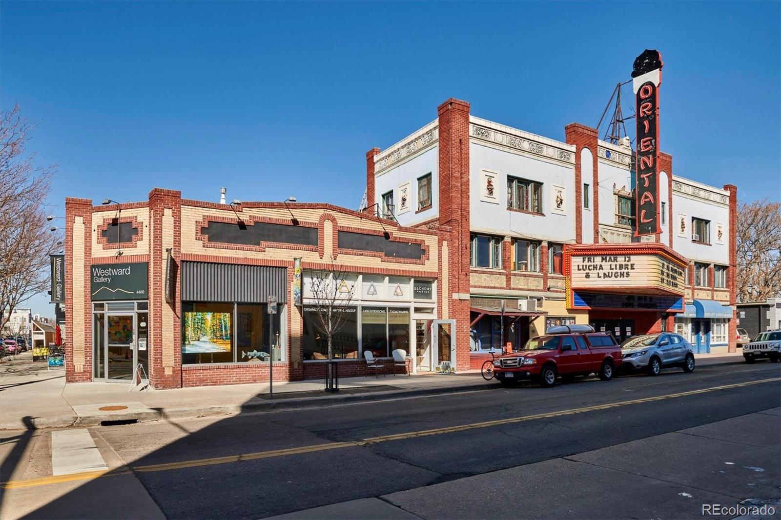 4170 North Lamar Street Wheat Ridge, CO 80033 - Photo 20 of 26 a view of a building with a car parked on the road