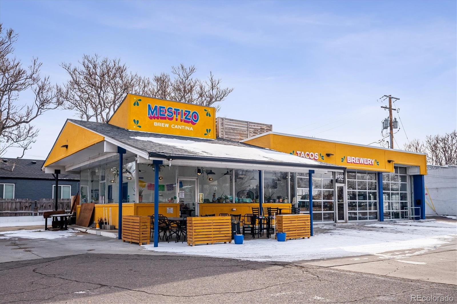 4170 North Lamar Street Wheat Ridge, CO 80033 - Photo 21 of 26 a view of a building with large trees