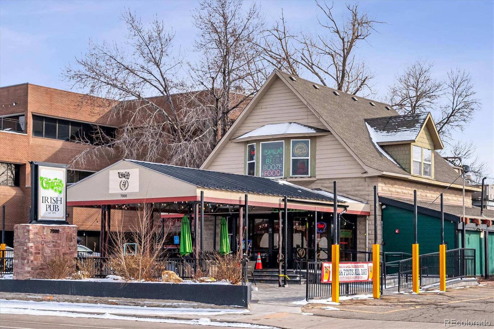 4170 North Lamar Street Wheat Ridge, CO 80033 - Photo 23 of 26 a view of a large building with a large windows