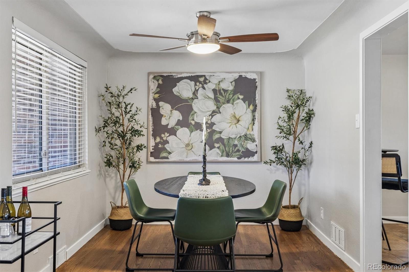 4170 North Lamar Street Wheat Ridge, CO 80033 - Photo 6 of 26 a view of a dining room with furniture and chandelier