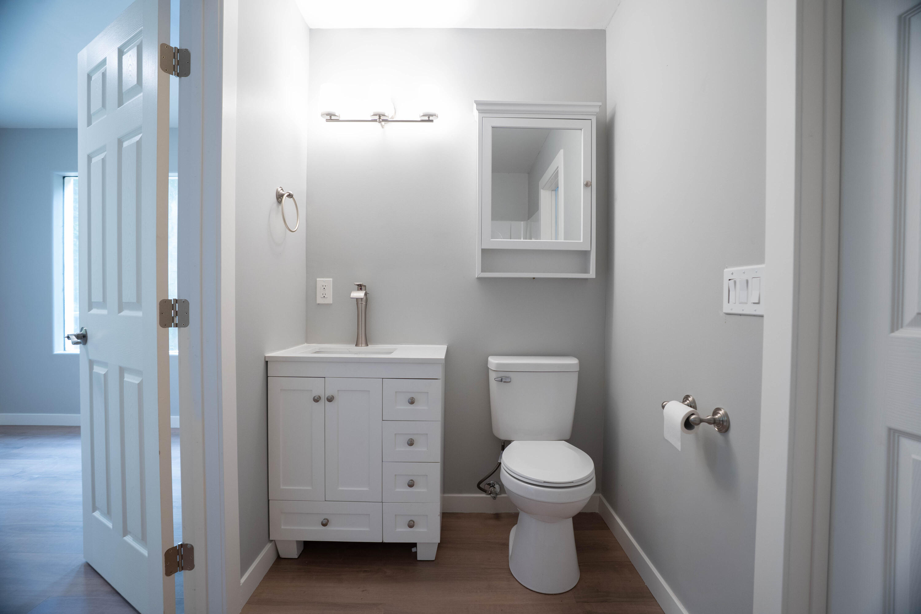 709 Pinewood Way Cave Junction, OR 97523 - Photo 18 of 24 a bathroom with a toilet sink and mirror