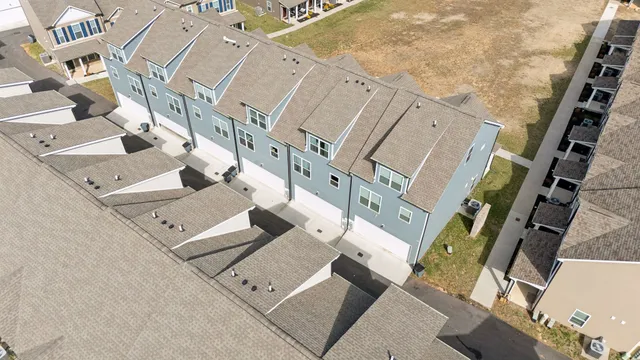a view of a hallway with a hardwood floor