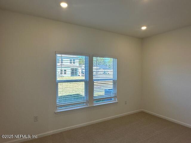 57 Camphor Laurel Road St. Augustine, FL 32092 - Photo 13 of 34 a view of an empty room with a window