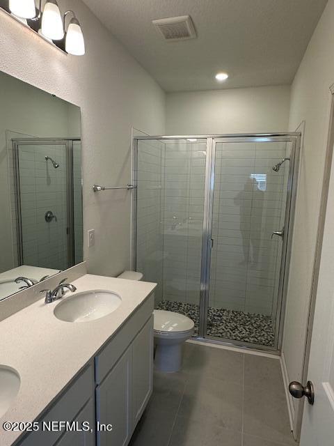 57 Camphor Laurel Road St. Augustine, FL 32092 - Photo 16 of 34 a bathroom with a sink a toilet and shower