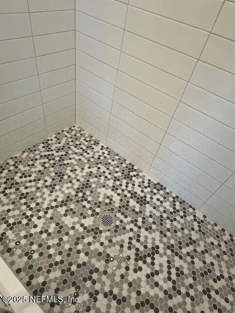 57 Camphor Laurel Road St. Augustine, FL 32092 - Photo 18 of 34 a bathroom with a shower