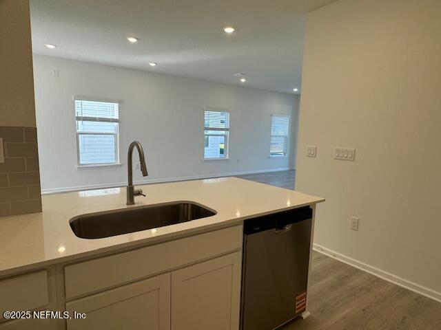 57 Camphor Laurel Road St. Augustine, FL 32092 - Photo 8 of 34 a kitchen with a sink and wooden floor