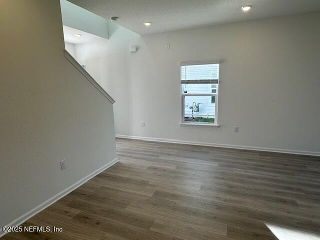 57 Camphor Laurel Road St. Augustine, FL 32092 - Photo 9 of 34 a view of an empty room with wooden floor and a window