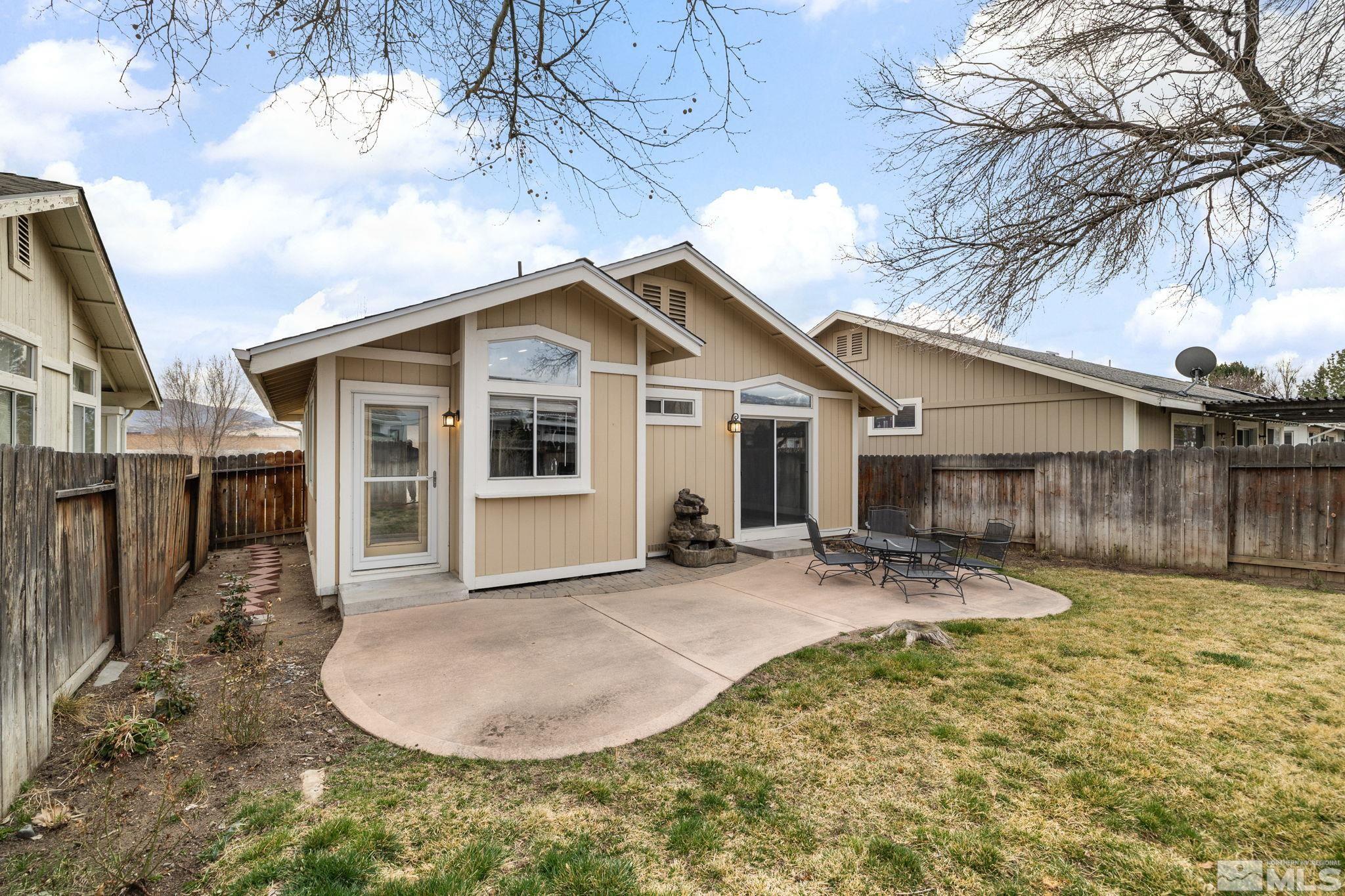 7577 Water View Way Reno, NV 89511 - Photo 18 of 20 a view of a house with a patio