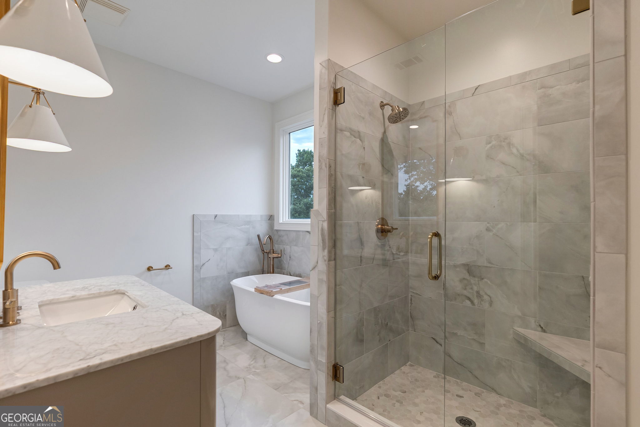 1321 Garrett Road Statham, GA 30666 - Photo 50 of 161 a bathroom with a granite countertop sink a toilet and shower