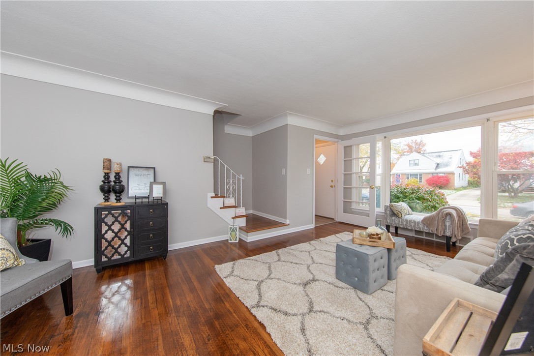 4238 Stonehaven Road Cleveland, OH 44121 - Photo 2 of 25 The beautiful, freshly painted, Living Room with hardwood floor, cove ceiling and large picture window