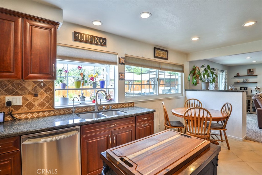 321 Blossom Place Brea, CA 92821 - Photo 14 of 48 a kitchen with a sink a stove and a refrigerator
