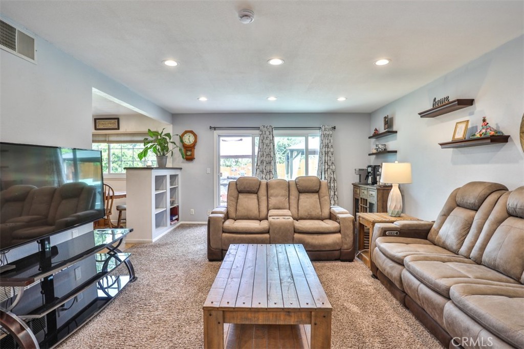 321 Blossom Place Brea, CA 92821 - Photo 18 of 50 a living room with furniture and a flat screen tv