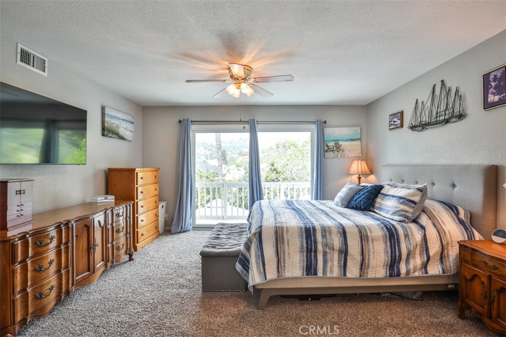 321 Blossom Place Brea, CA 92821 - Photo 25 of 50 a bed sitting in a bedroom next to a window