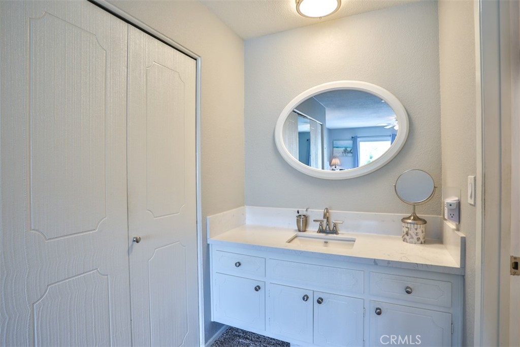 321 Blossom Place Brea, CA 92821 - Photo 27 of 48 a bathroom with a sink and a mirror