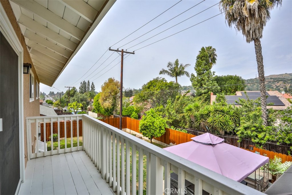 321 Blossom Place Brea, CA 92821 - Photo 27 of 50 a view of a balcony with wooden floor