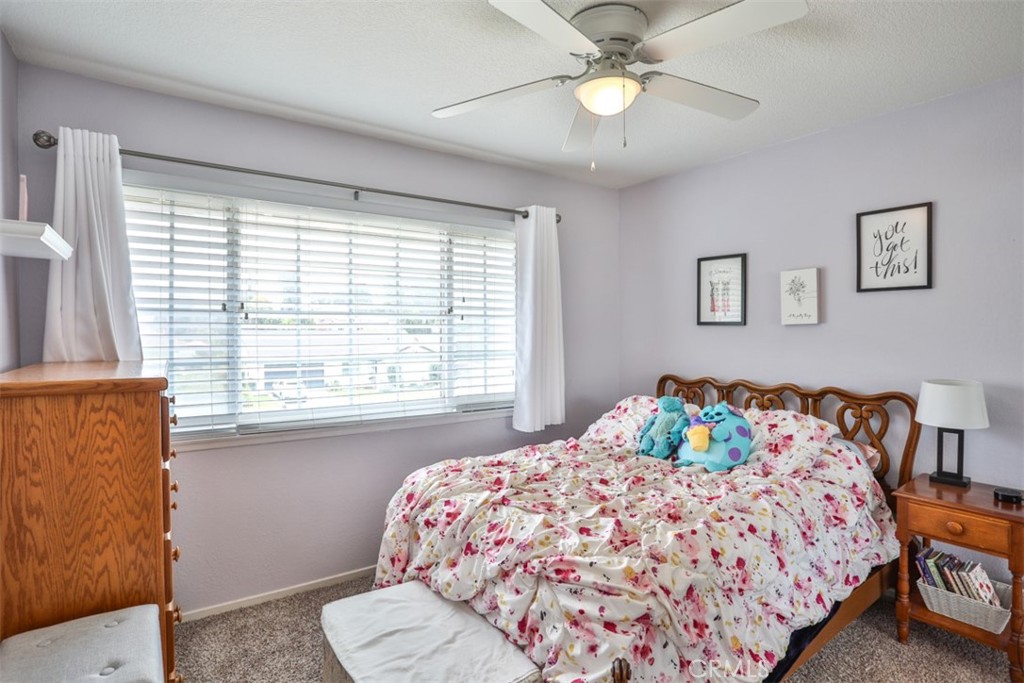 321 Blossom Place Brea, CA 92821 - Photo 37 of 48 a bedroom with a bed and a window