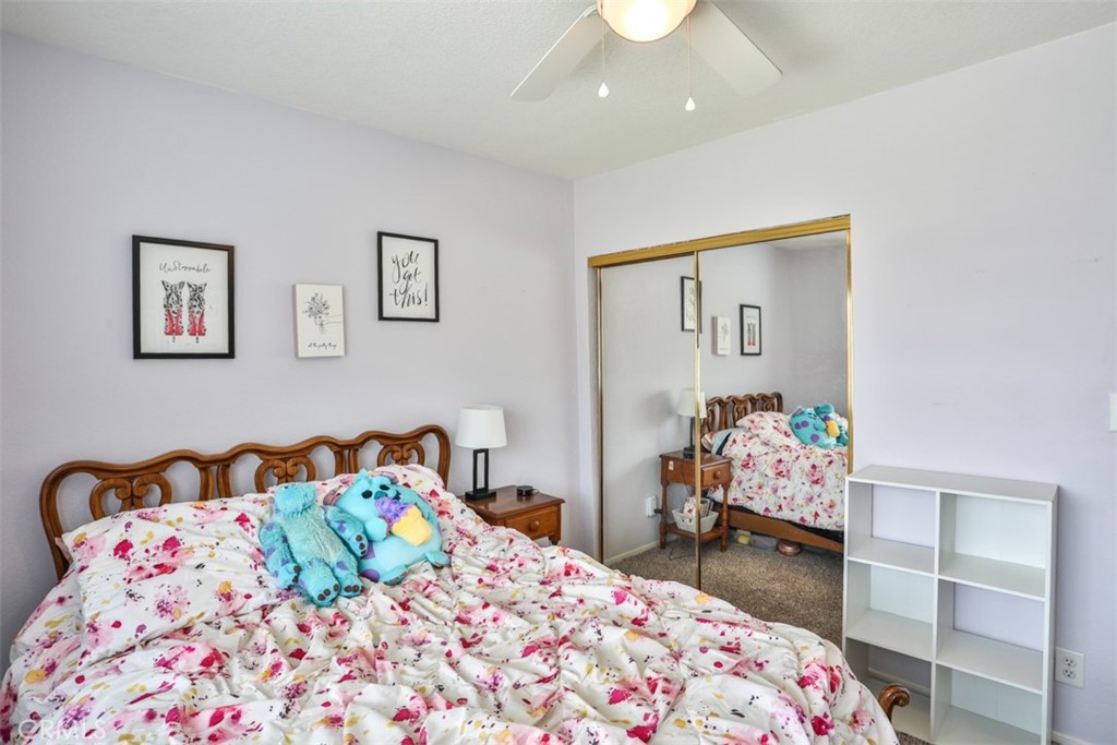 321 Blossom Place Brea, CA 92821 - Photo 40 of 50 a bedroom with a bed and a dresser in it