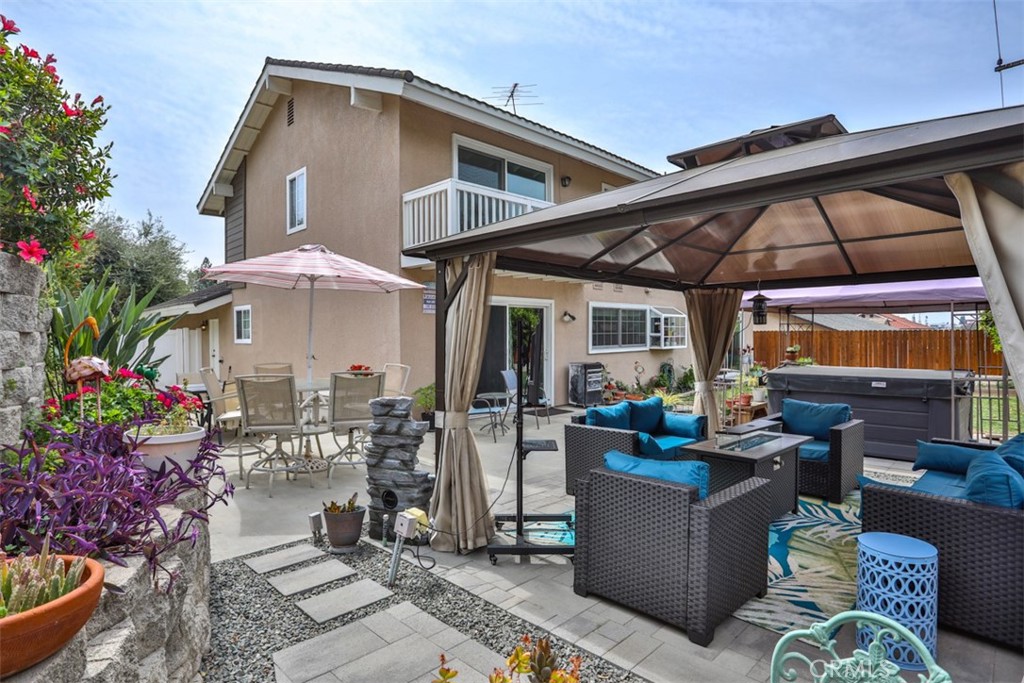 321 Blossom Place Brea, CA 92821 - Photo 43 of 48 a outdoor living space with patio furniture and potted plants