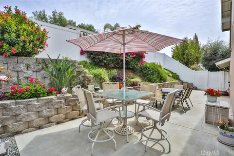 a view of outdoor kitchen and patio