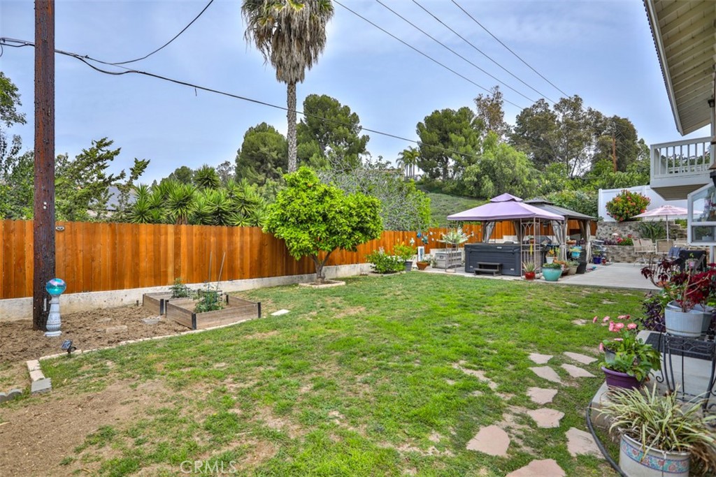 321 Blossom Place Brea, CA 92821 - Photo 46 of 50 a backyard of a house with lots of green space