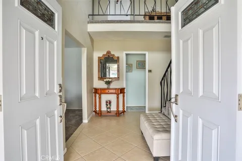 a view of front door with furniture