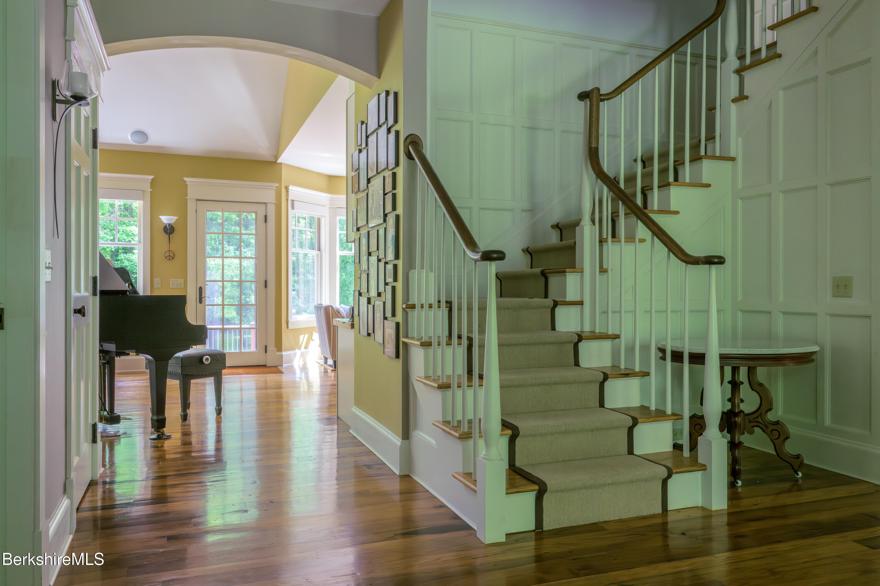 430 Lenox Road Richmond, MA 01254 - Photo 17 of 66 a view of stairs and dining room with wooden floor