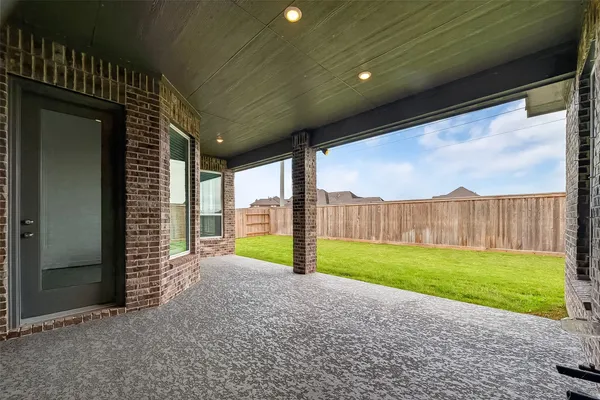 a view of a backyard with porch