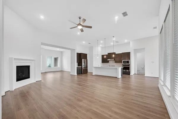 a view of kitchen with furniture and fireplace