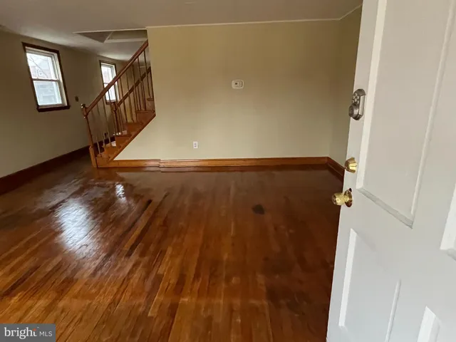a view of entryway with wooden floor