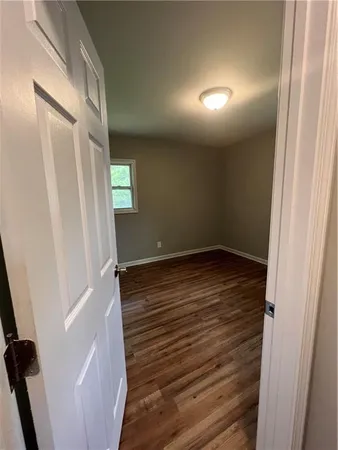 a view of wooden floor in an empty room