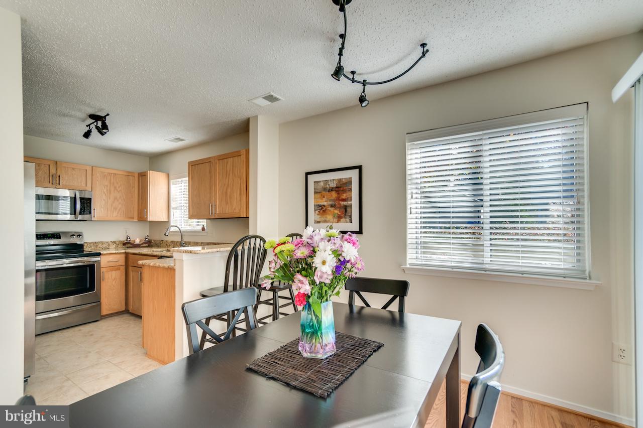 11031 Villaridge Court Reston, VA 20191 - Photo 11 of 38 Dining Room - With Breakfast bar