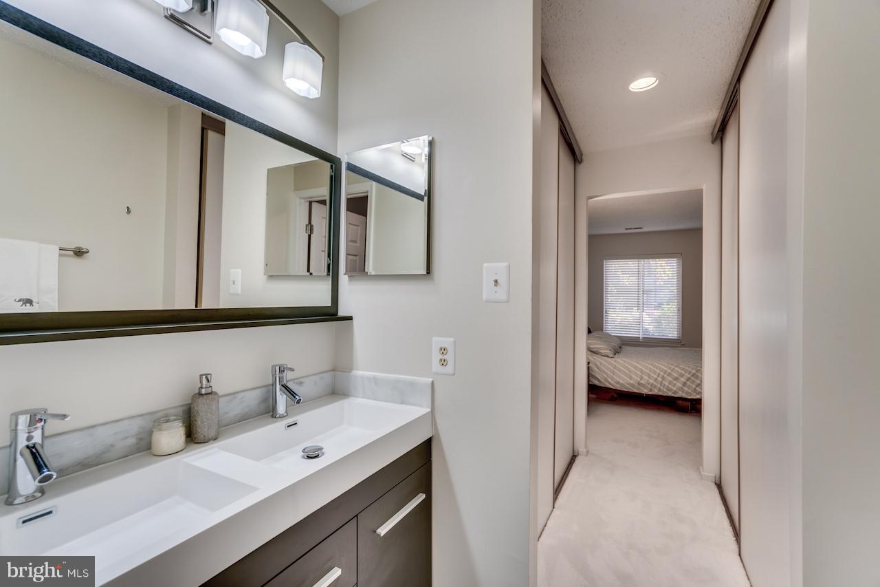 11031 Villaridge Court Reston, VA 20191 - Photo 22 of 38 Master Bathroom with view to master bedroom