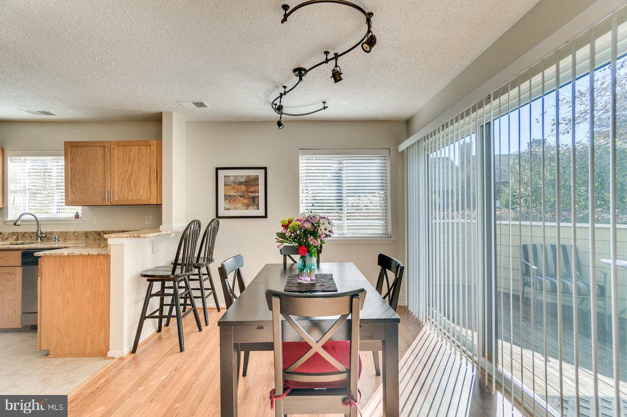 11031 Villaridge Court Reston, VA 20191 - Photo 10 of 38 Dining Room - New Sliding Door & light fixture!