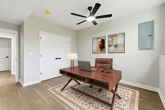 a workspace with furniture and a window