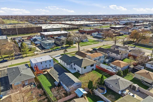 an aerial view of a building with outdoor space
