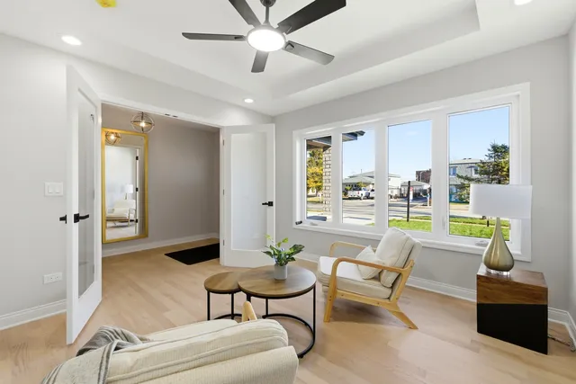 a living room with furniture and a table