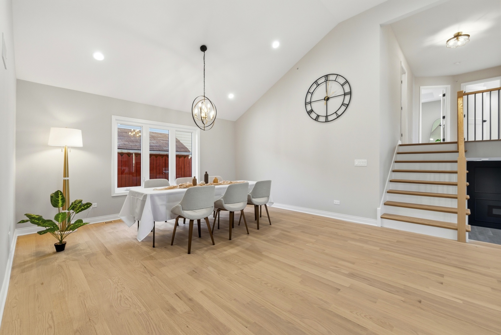 8332 South 77th Court Bridgeview, IL 60455 - Photo 6 of 26 a view of a dining room with furniture and a chandelier