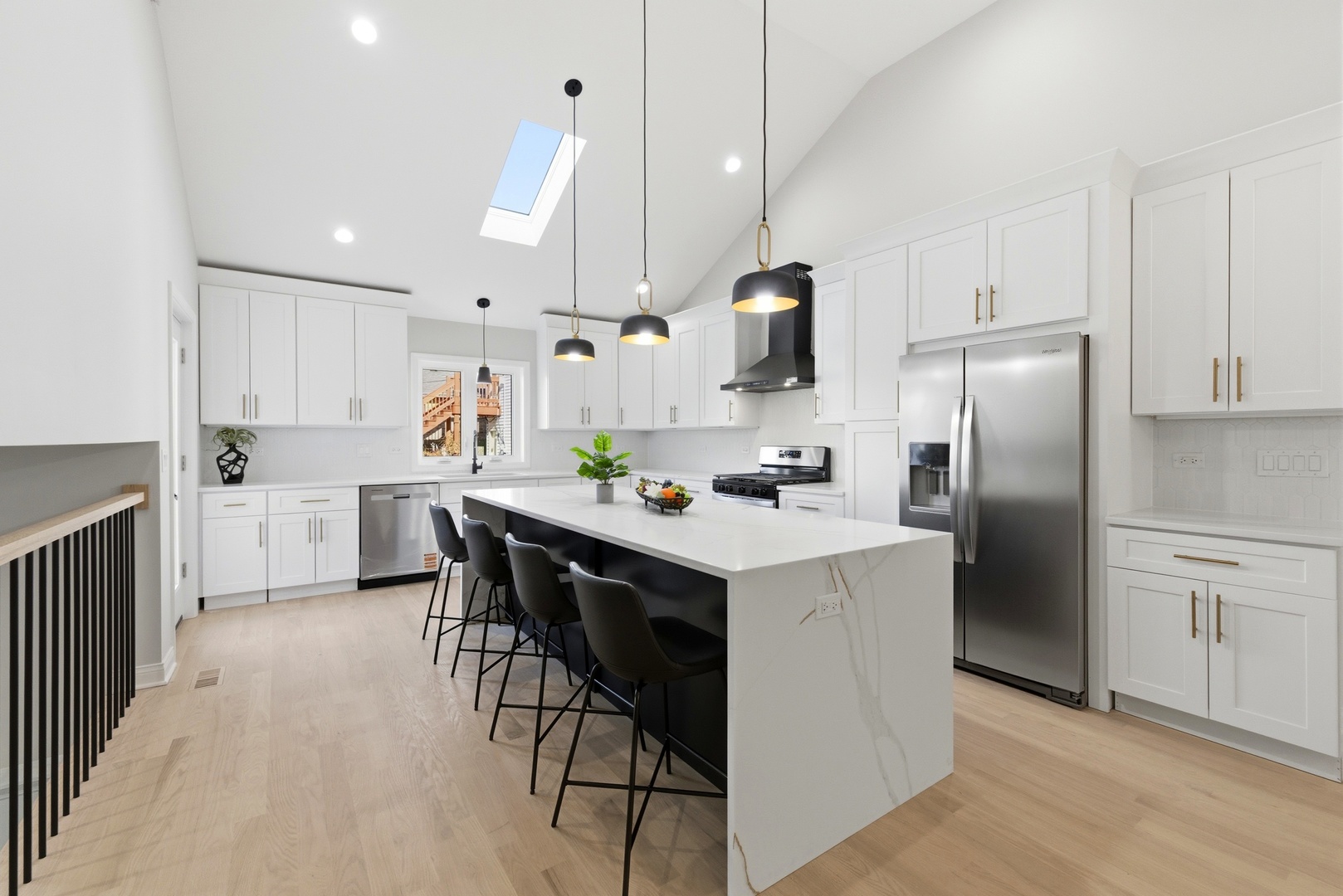 8332 South 77th Court Bridgeview, IL 60455 - Photo 8 of 26 a kitchen with white cabinets and stainless steel appliances