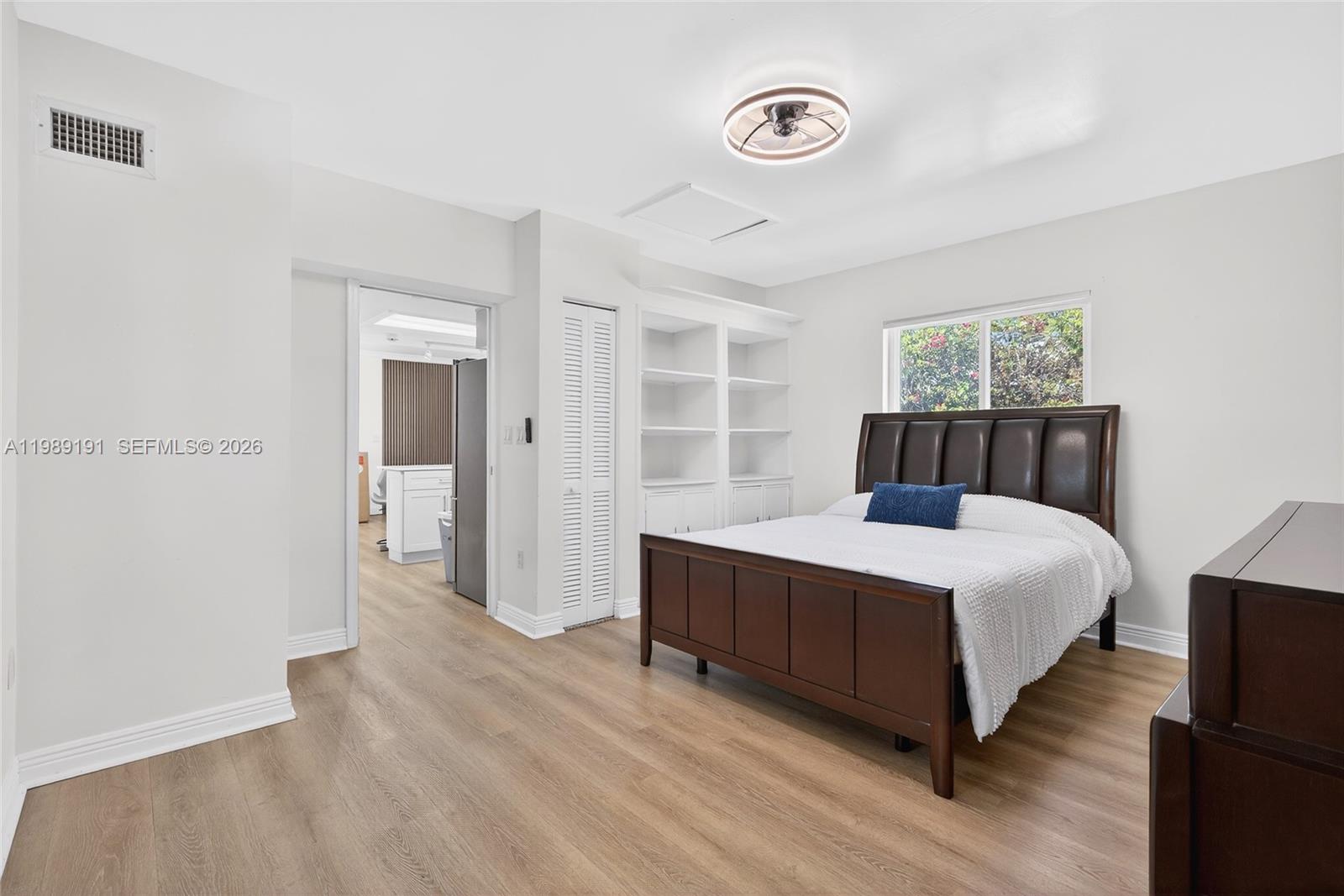 2431 Southwest 4th Street Miami, FL 33135 - Photo 15 of 33 a bedroom with a bed and a window