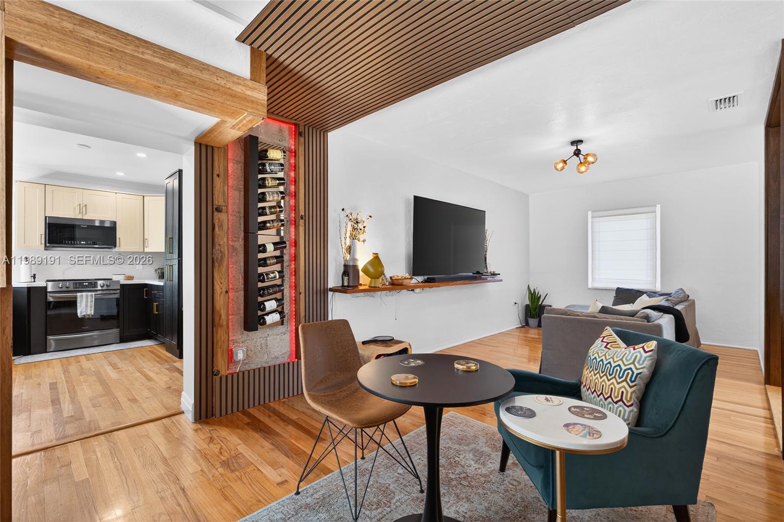 2431 Southwest 4th Street Miami, FL 33135 - Photo 24 of 33 a living room with furniture and a flat screen tv